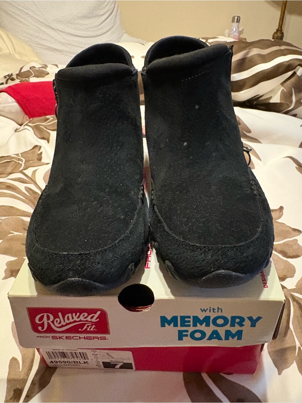 Skechers women’s black Boots with Memory Foam.